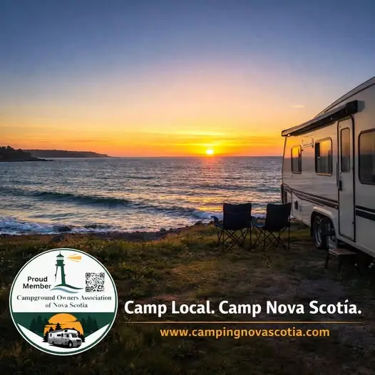 A camper van and two chairs are set up on a grassy area overlooking the ocean at sunset, with "Camp Local. Camp Nova Scotia." and a website URL in the foreground.